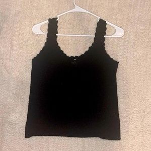 Black knit tank top with scalloped trim